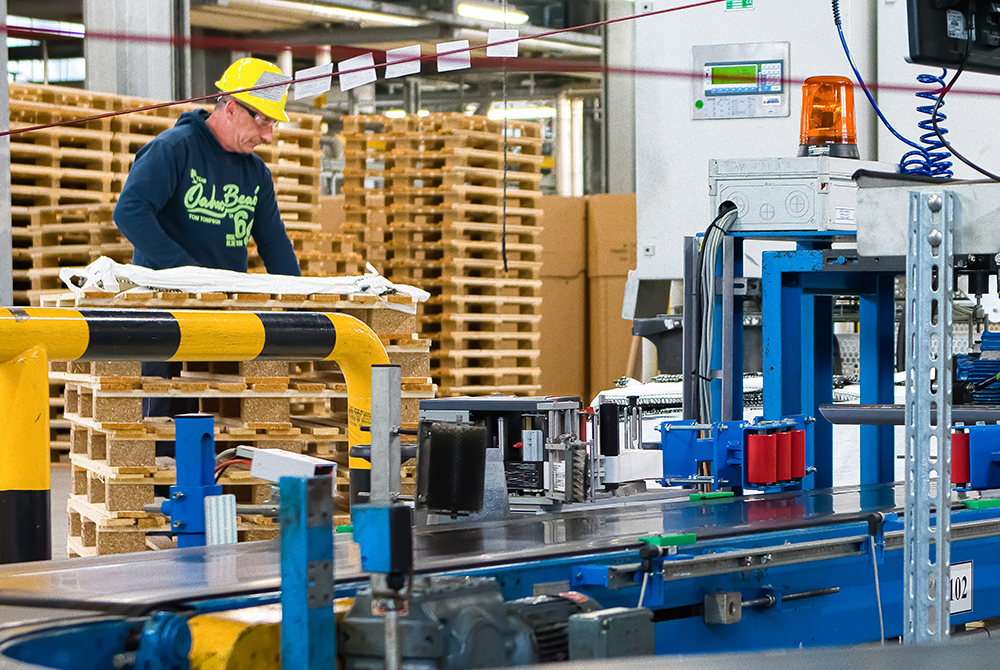 Employee wearing safety equipment while working